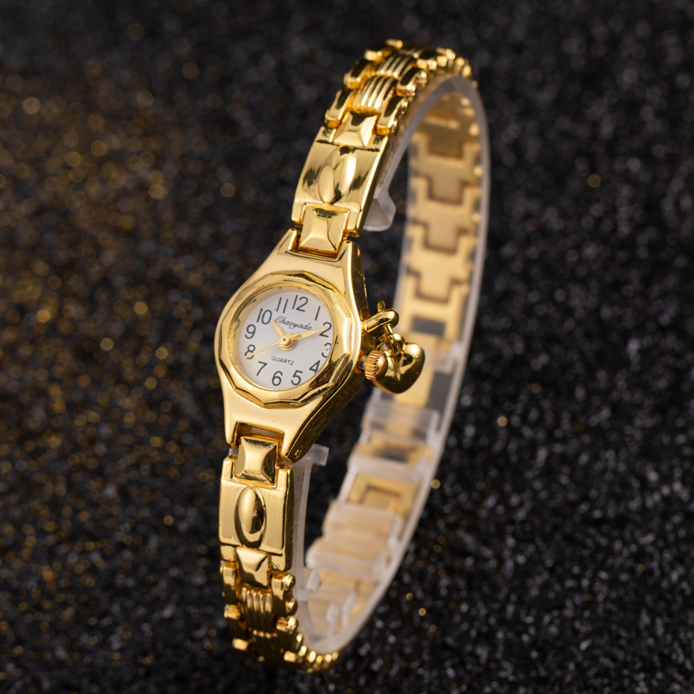 Damespolshorloge Gouden armban - Open Heart Watch recensie en prijs